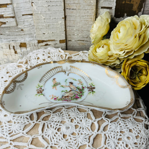 VINTAGE PORCELAIN CHERUB BONE PLATE