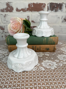 PAIR OF MILK GLASS ORNATE GRAPE MOTIF CANDLESTICK HOLDERS