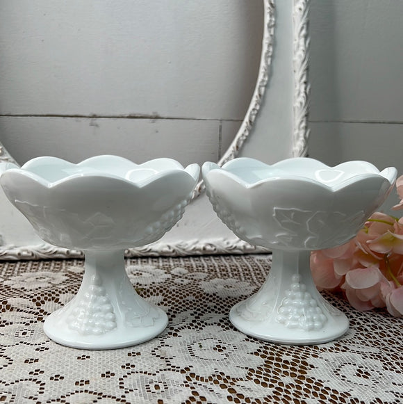 PAIR OF MILK GLASS GRAPE MOTIF ORNATE CANDLESTICK HOLDERS