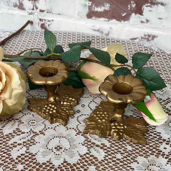 SOLID BRASS TONED FLORAL AND GRAPE MOTIF CANDLESTICK HOLDERS