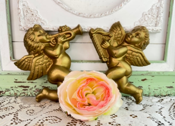 PAIR OF SYROCO CHERUBS