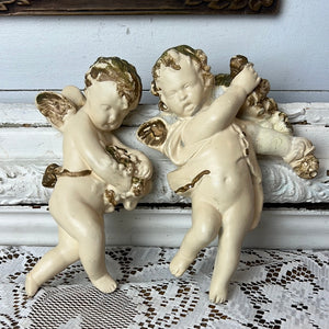 PAIR OF ANGEL WALL PLAQUE STATUETTES