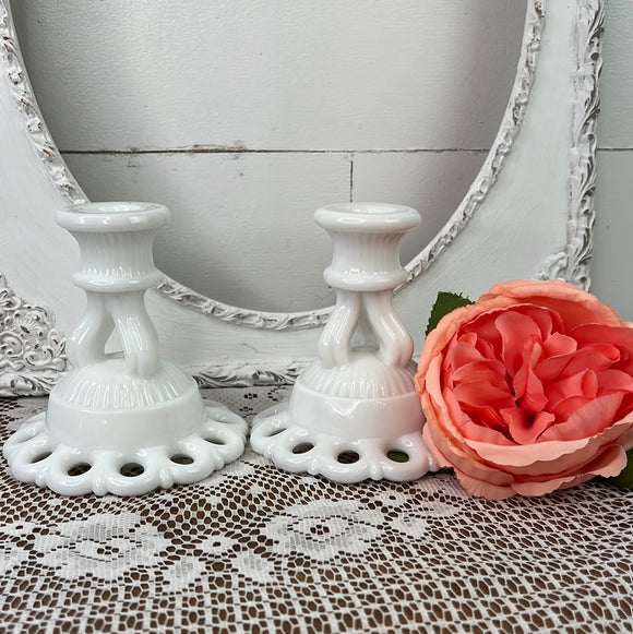 PAIR OF MILK GLASS ORNATE CANDLESTICK HOLDERS