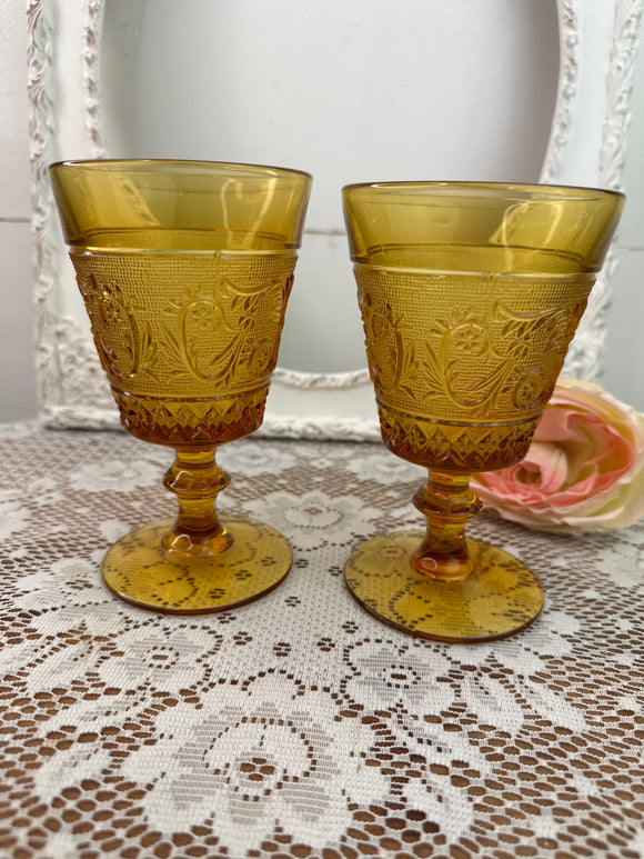 PAIR OF DUNCAN MILLER AMBER GLASSES