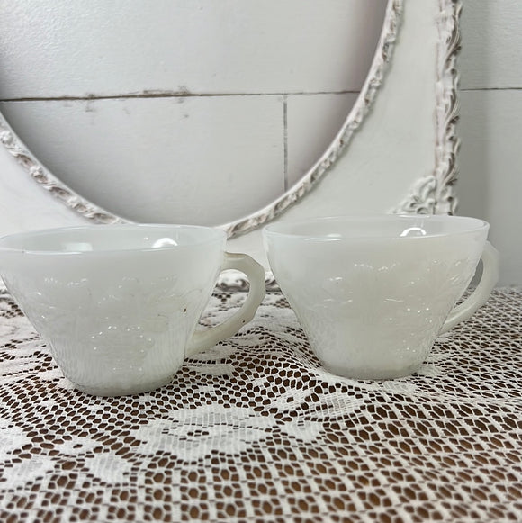 PAIR OF MILK GLASS GRAPE MOTIF TEACUPS