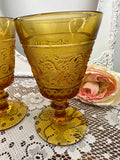 PAIR OF DUNCAN MILLER AMBER GLASSES